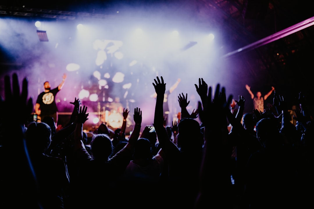 Live performance stage with full lighting and audio production setup