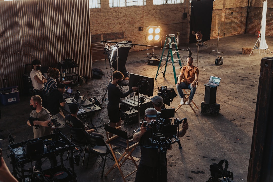 Film and video production crew with equipment on set
